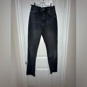 Urban outfitters, skinny, black jeans, a little fringe at the bottom